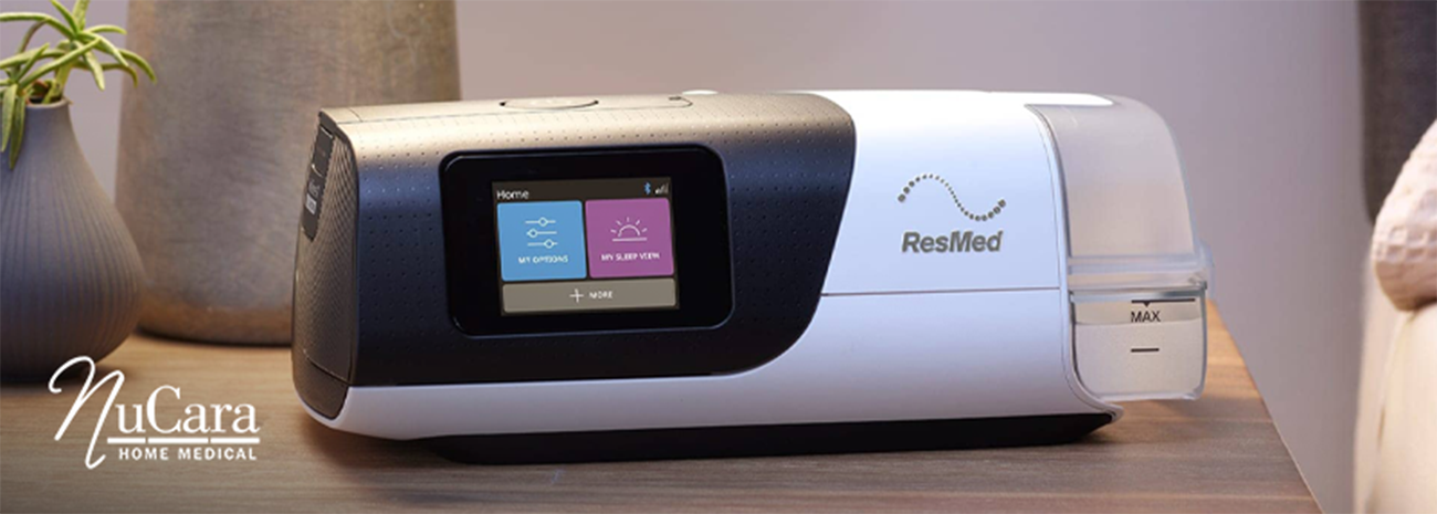 ResMed AirSense 11 CPAP machine on bedside table