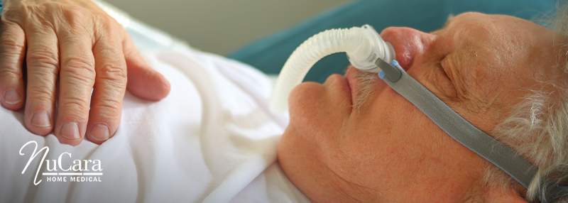 Man sleeping with CPAP mask on