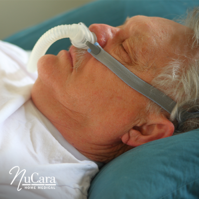 Man sleeping with CPAP mask on