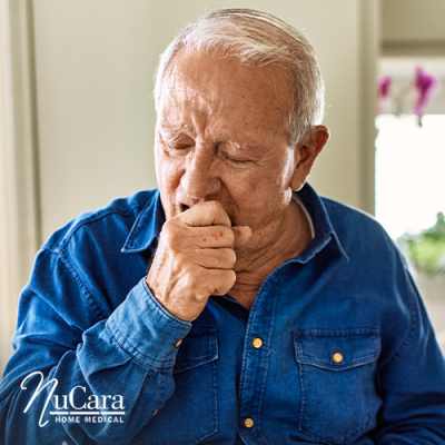 Older gentleman coughing into his hand