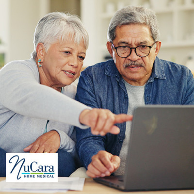 Older couple looking at computer screen together